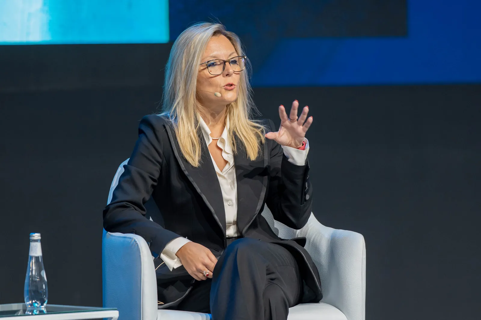 Cristina Savian speaking on stage at Cityscape Global, Riyadh